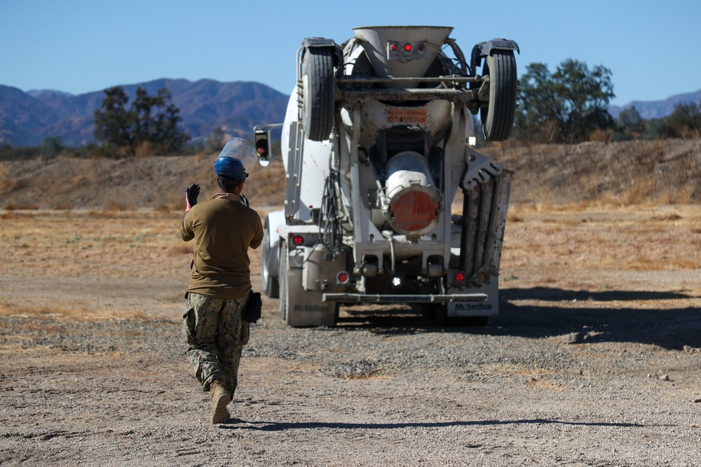 NMCB 4 Seabees Place Concrete for Ft. Hunter Liggett Pistol Qualification Range