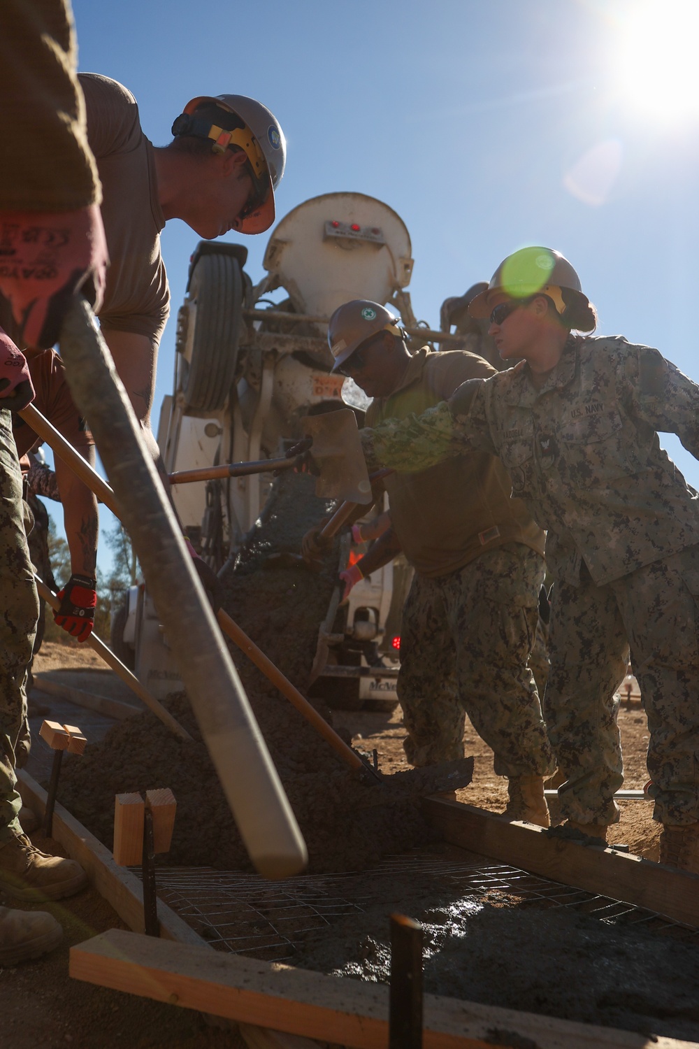 NMCB 4 Seabees Place Concrete for Ft. Hunter Liggett Pistol Qualification Range