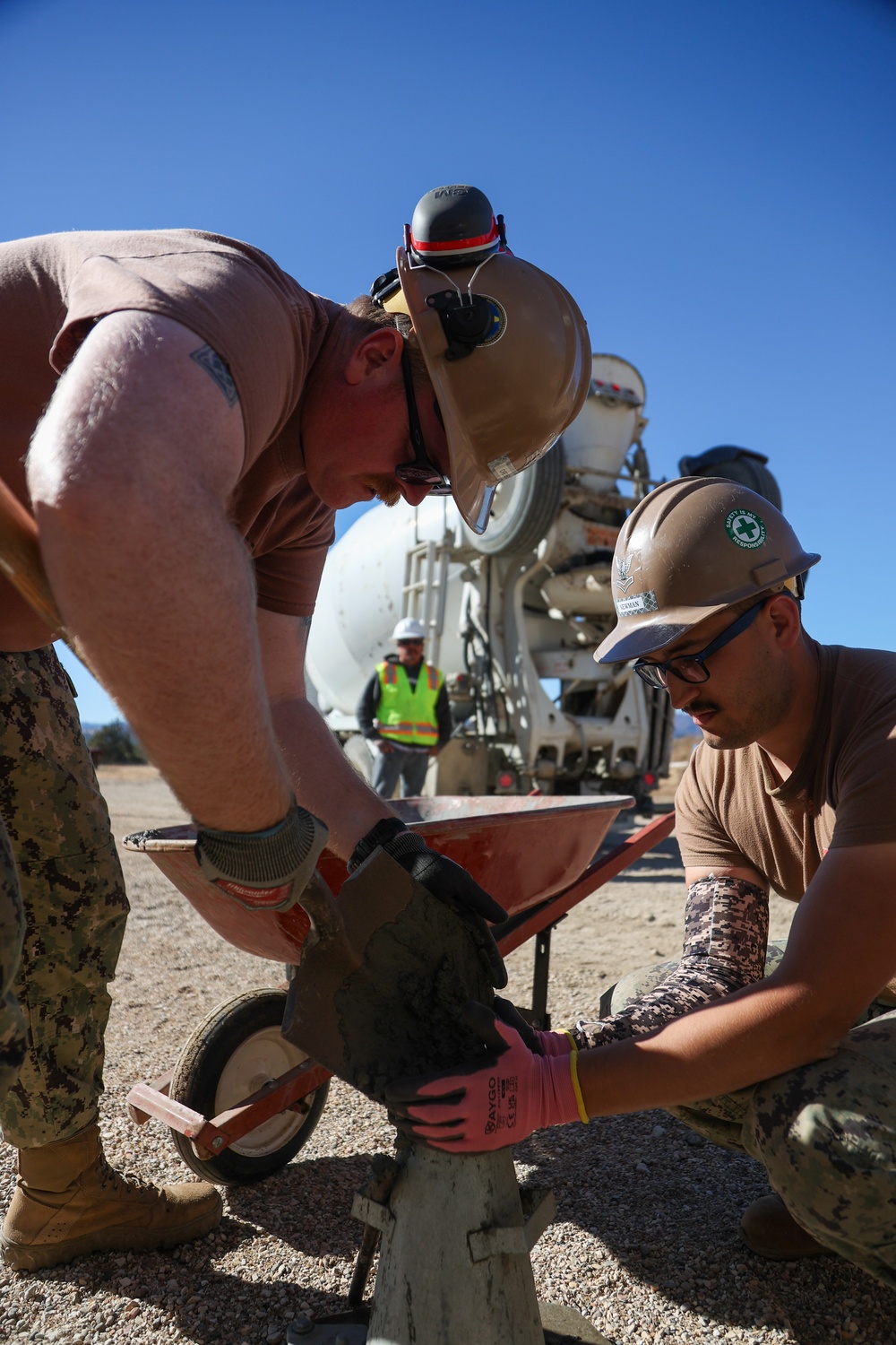 NMCB 4 Seabees Place Concrete for Ft. Hunter Liggett Pistol Qualification Range