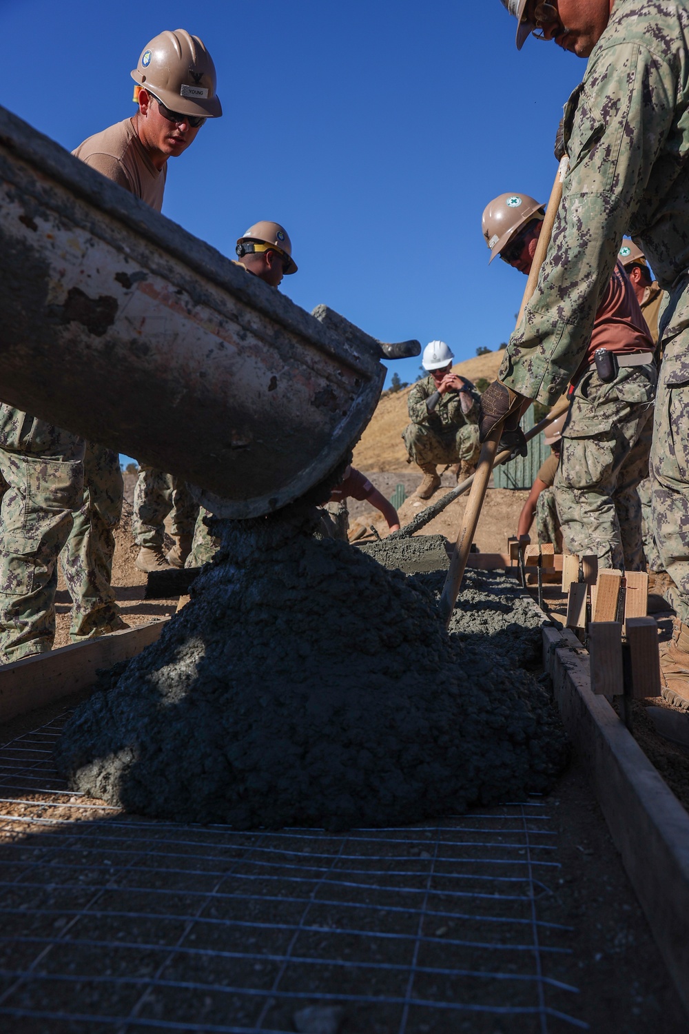 NMCB 4 Seabees Place Concrete for Ft. Hunter Liggett Pistol Qualification Range