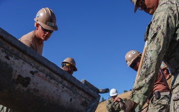 NMCB 4 Seabees Place Concrete for Ft. Hunter Liggett Pistol Qualification Range