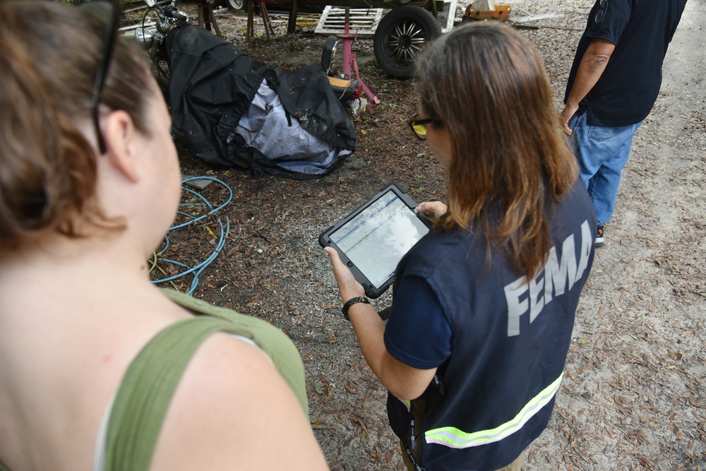 FEMA DSA outreach specialists are providing information to hurricane survivors