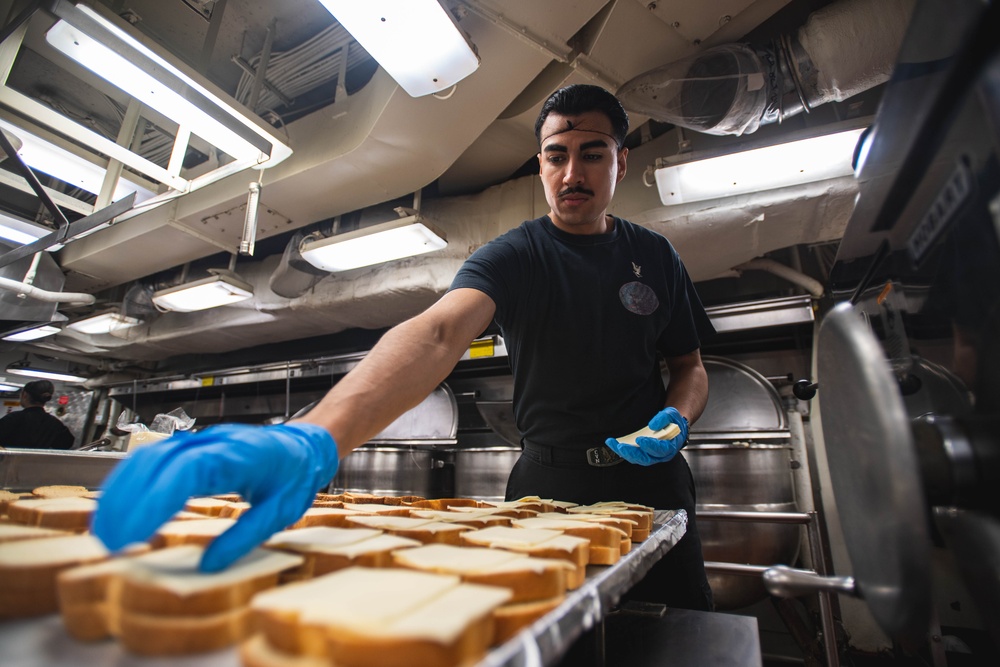 USS Ronald Reagan (CVN 76) Sailors serve lunch