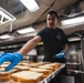 USS Ronald Reagan (CVN 76) Sailors serve lunch