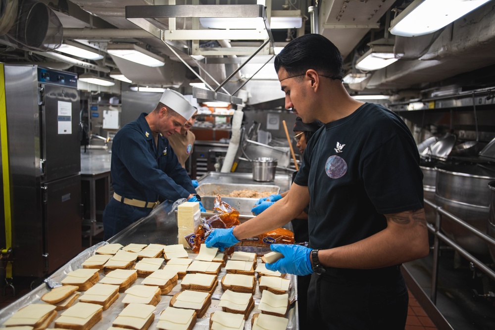 USS Ronald Reagan (CVN 76) Sailors serve lunch