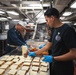 USS Ronald Reagan (CVN 76) Sailors serve lunch