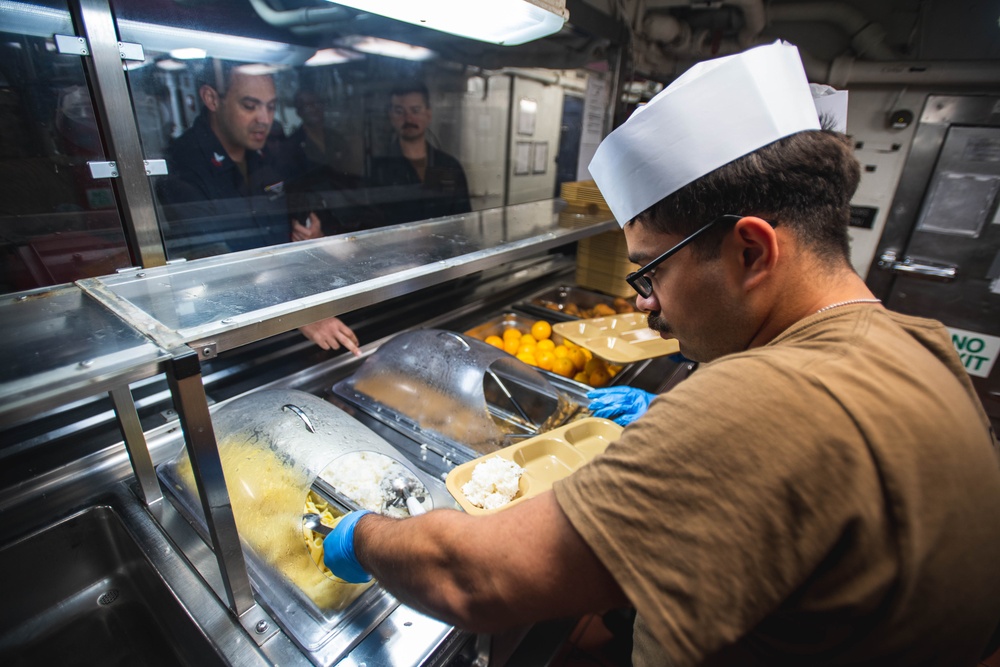 USS Ronald Reagan (CVN 76) Sailors serve lunch