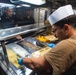 USS Ronald Reagan (CVN 76) Sailors serve lunch