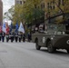 A member of the U.S. Navy Cruiser Division participates in the Milwaukee Veterans Day Parade