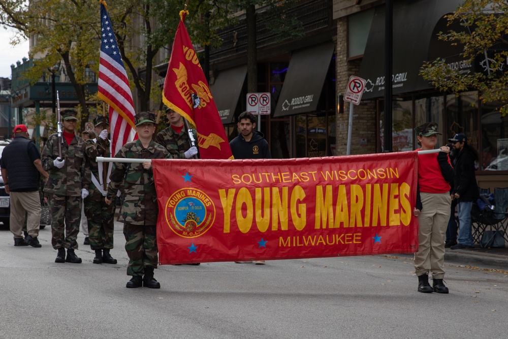 Members of the Southeast Wisconsin Young Marines march during the Milwaukee Veterans Day Parade