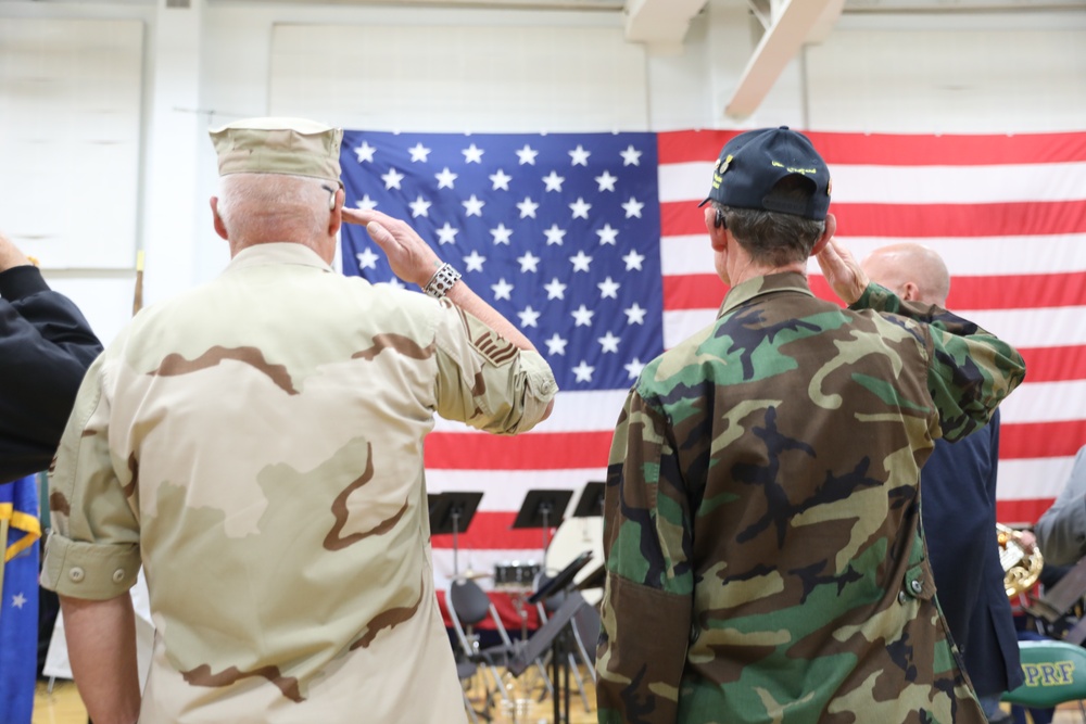 U.S. Military Veterans salute the flag during Operation Honor 2024