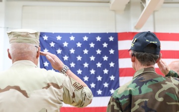 U.S. Military Veterans salute the flag during Operation Honor 2024