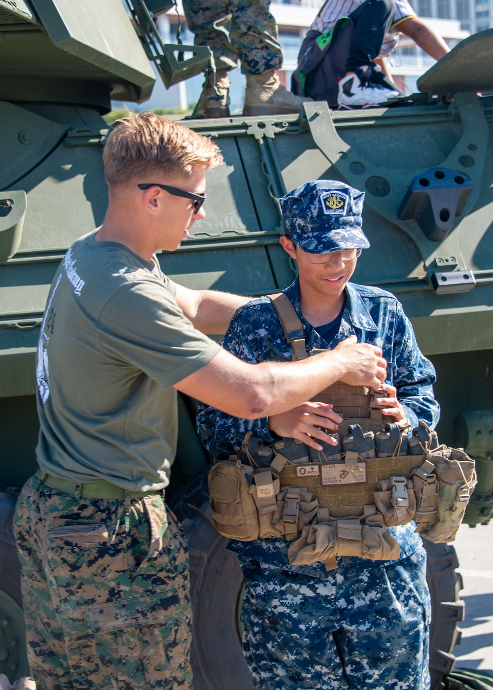 Military personel interact with the public on Broadway Pier Pavilion During Fleet Week San Diego 2024.