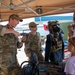 Military personel interact with the public on Broadway Pier Pavilion During Fleet Week San Diego 2024.