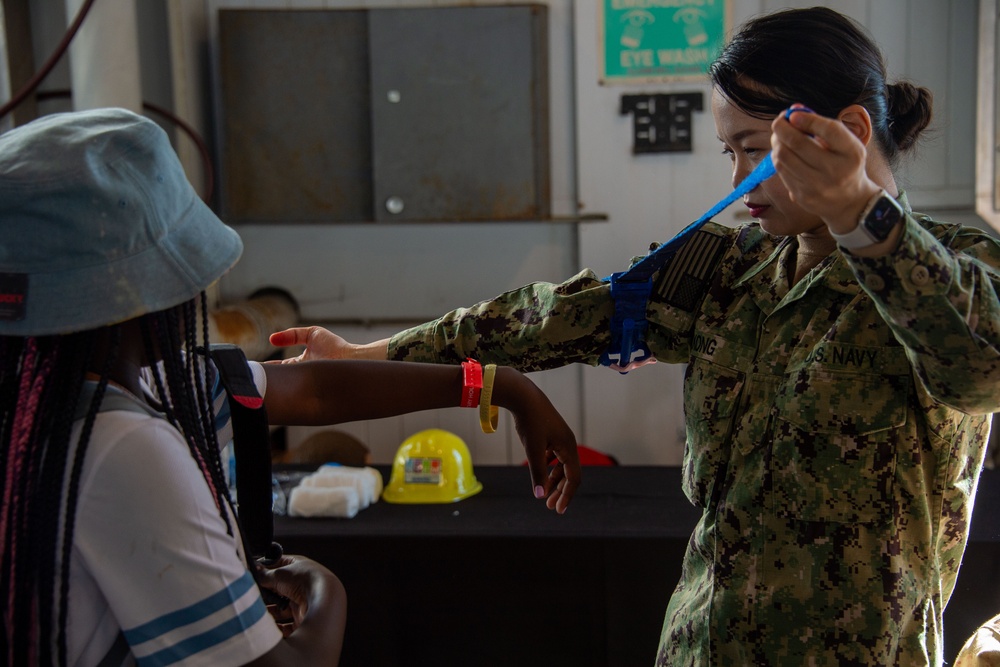 Military personel interact with the public on Broadway Pier Pavilion During Fleet Week San Diego 2024.