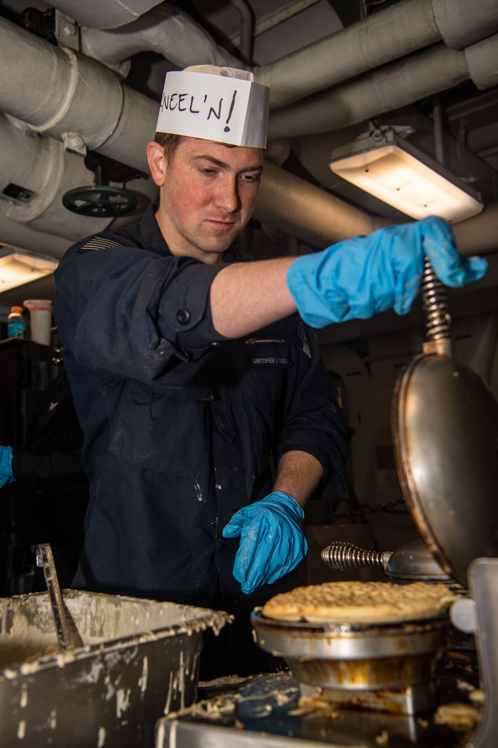 USS Ronald Reagan (CVN76) Sailors serve brunch