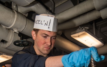 USS Ronald Reagan (CVN76) Sailors serve brunch