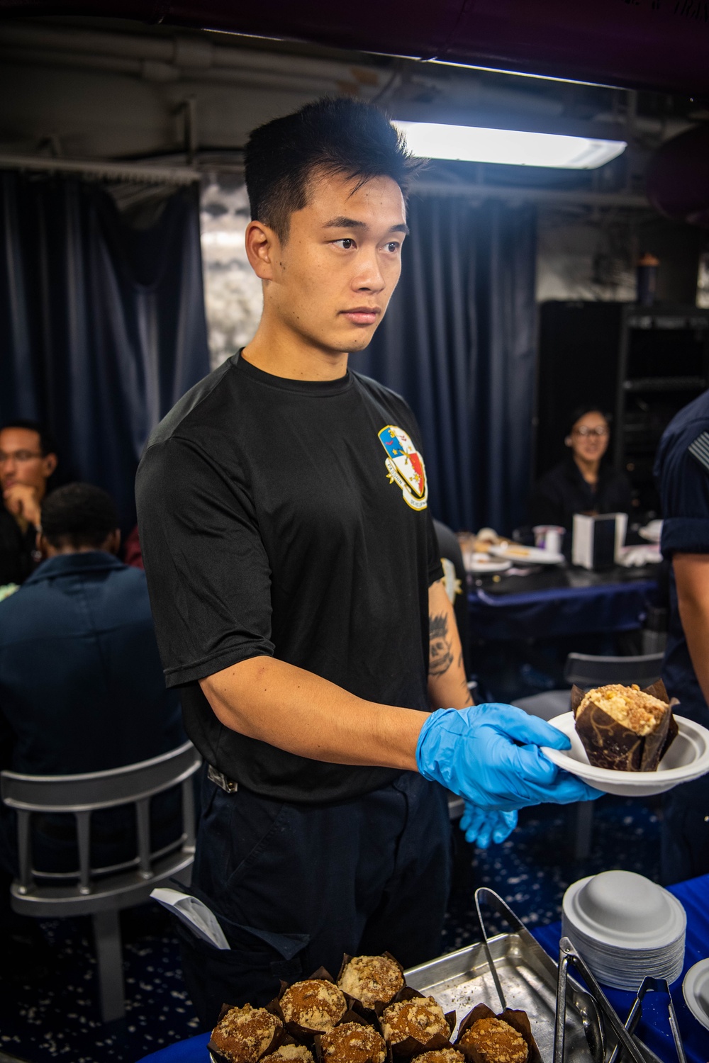 USS Ronald Reagan (CVN76) Sailors serve brunch