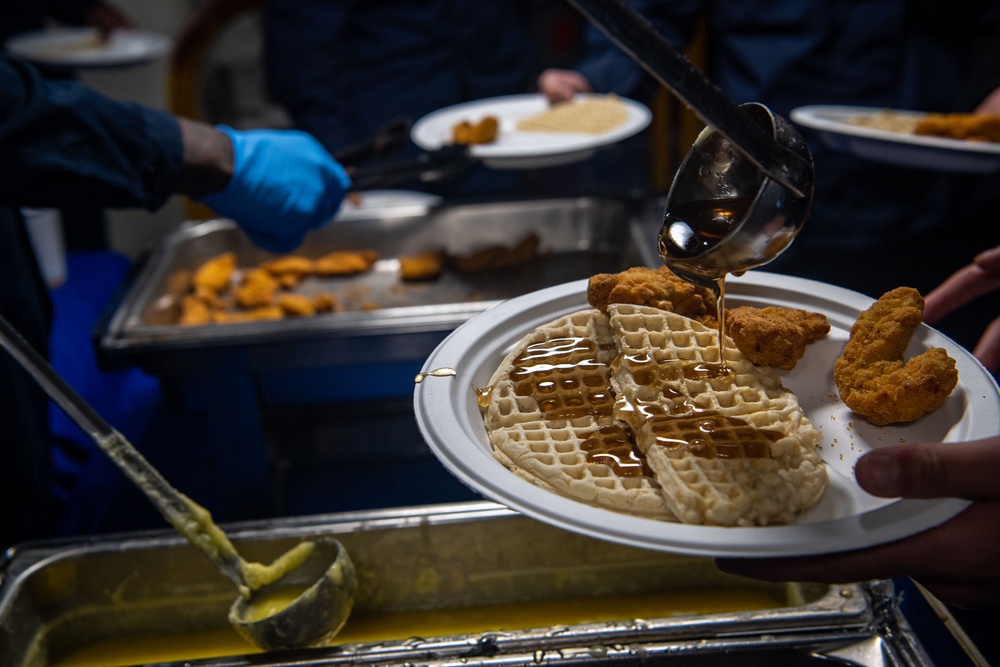 USS Ronald Reagan (CVN76) Sailors serve brunch