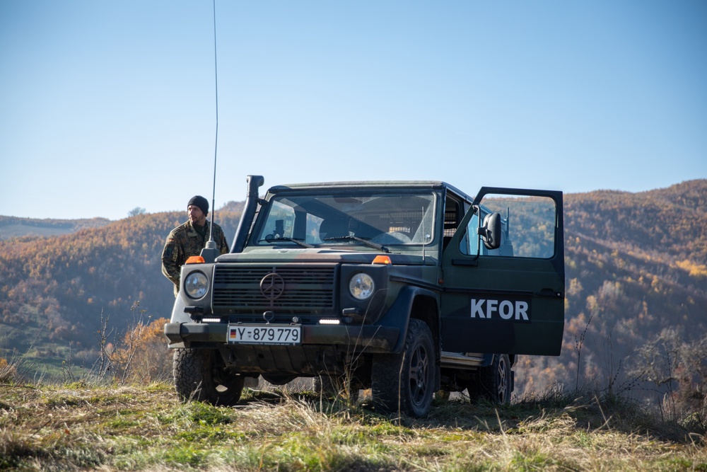 NATO-led KFOR soldiers conduct routine security patrol