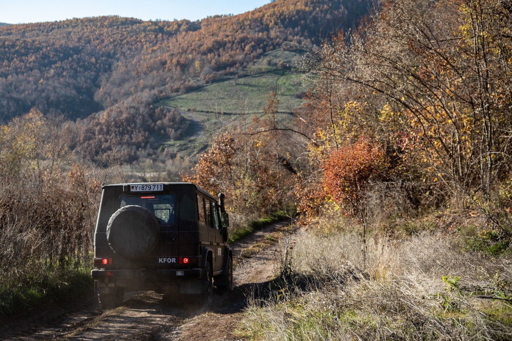 NATO-led KFOR soldiers conduct routine security patrol