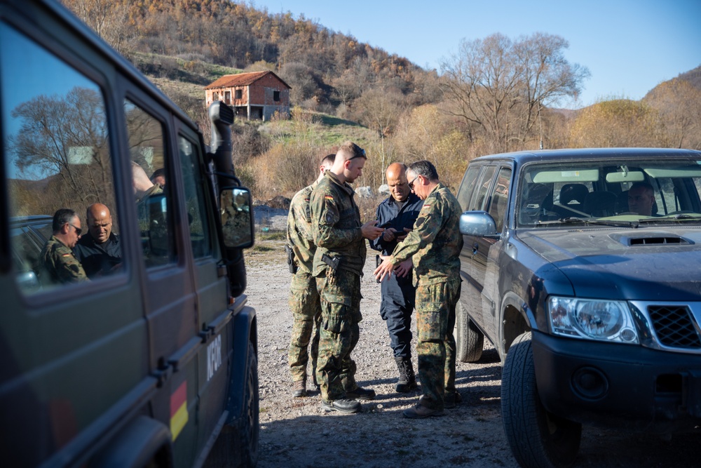 NATO-led KFOR soldiers conduct routine security patrol