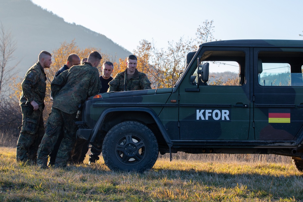 NATO-led KFOR soldiers conduct routine security patrol