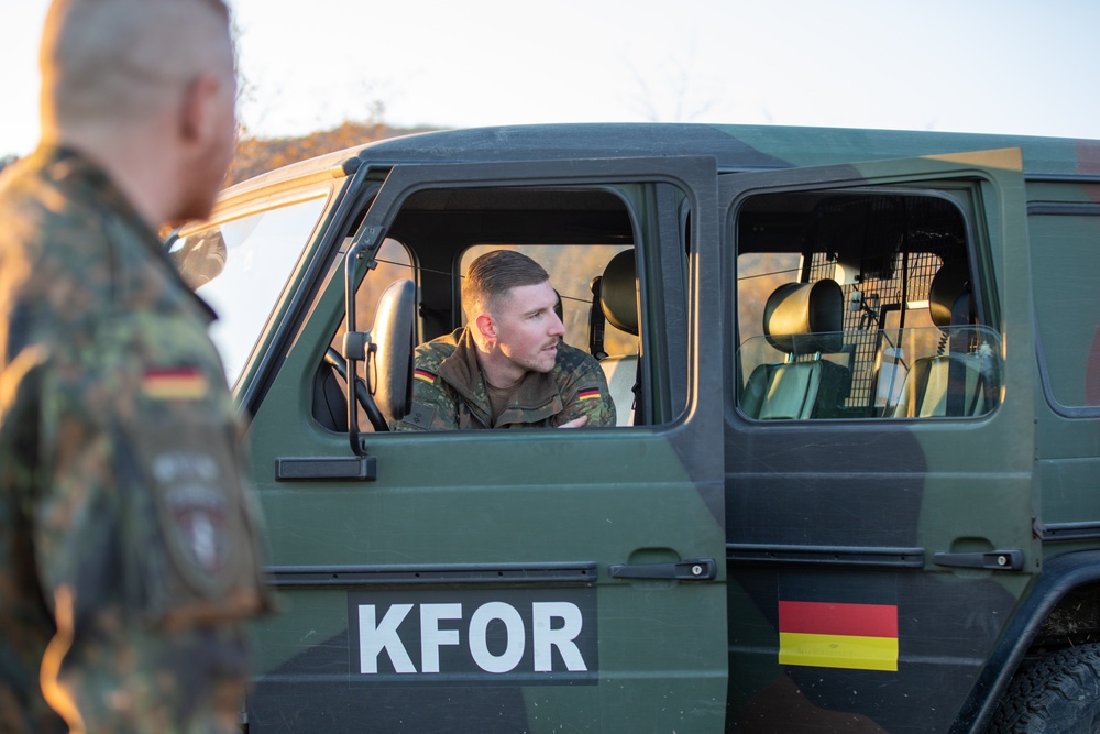 NATO-led KFOR soldiers conduct routine security patrol