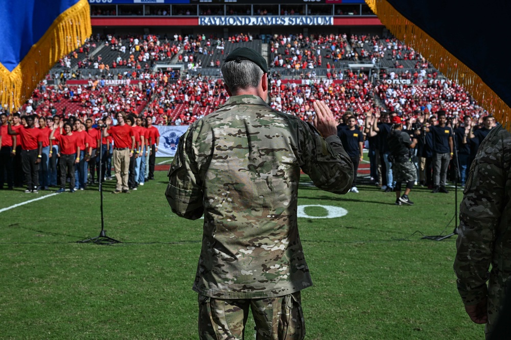 SOCOM commander administers oath of enlistement at Tampa Bay Buccaneers Salute to Service game