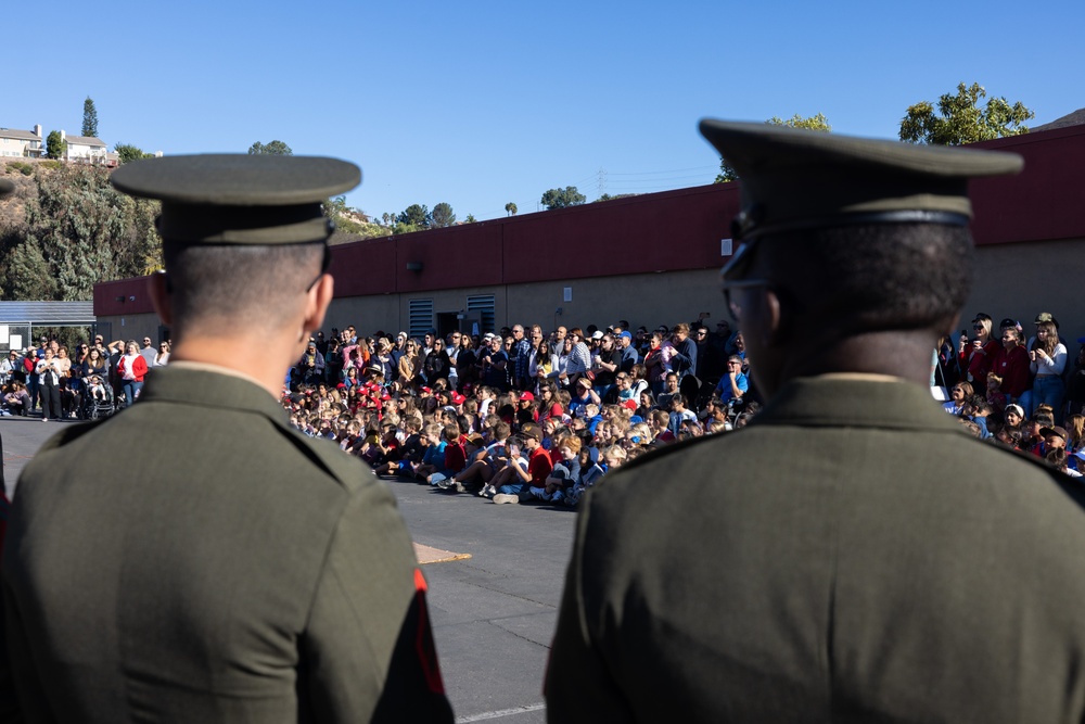 Marines spend time with students at the Annual Sunset Hills Elementary School Veterans Day Program