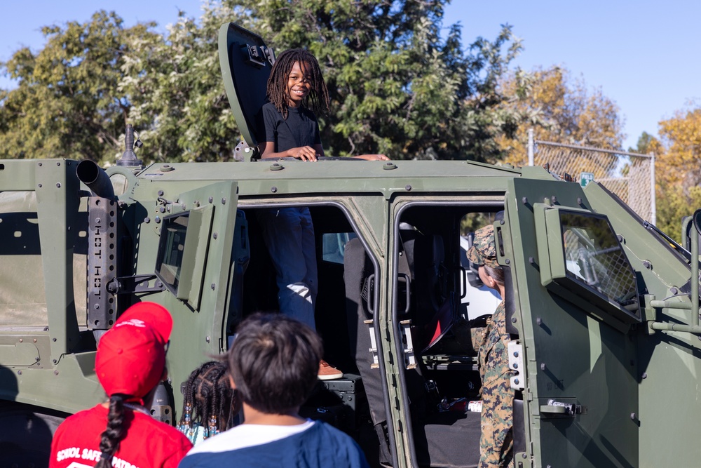 Marines spend time with students at the Annual Sunset Hills Elementary School Veterans Day Program