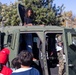 Marines spend time with students at the Annual Sunset Hills Elementary School Veterans Day Program