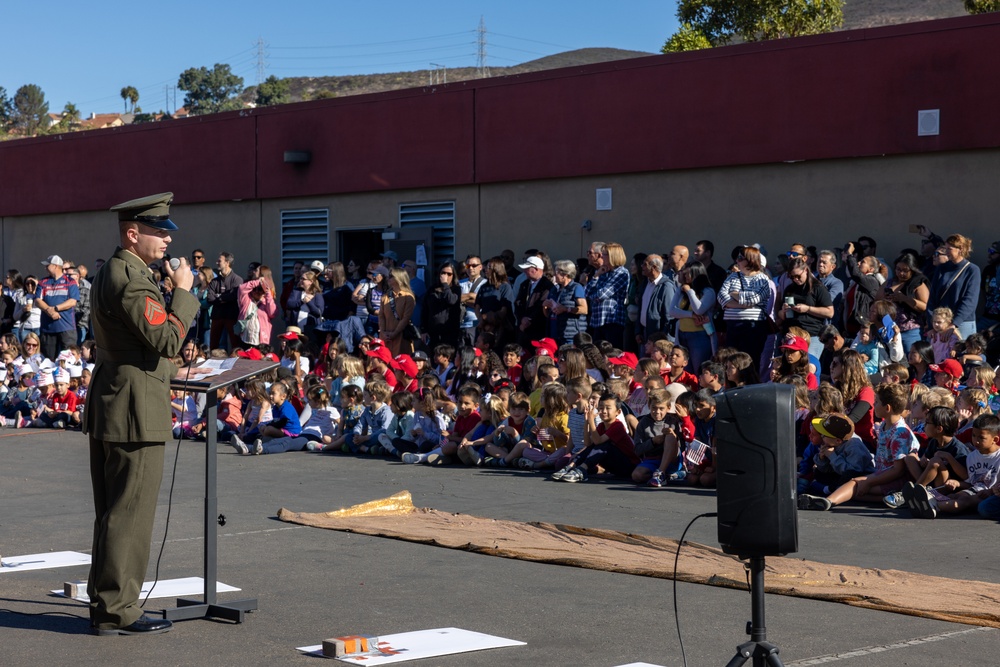 Marines spend time with students at the Annual Sunset Hills Elementary School Veterans Day Program