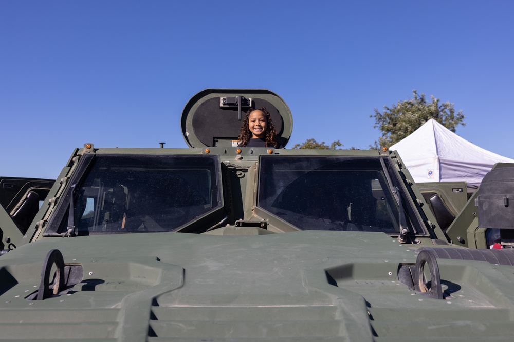 Marines spend time with students at the Annual Sunset Hills Elementary School Veterans Day Program