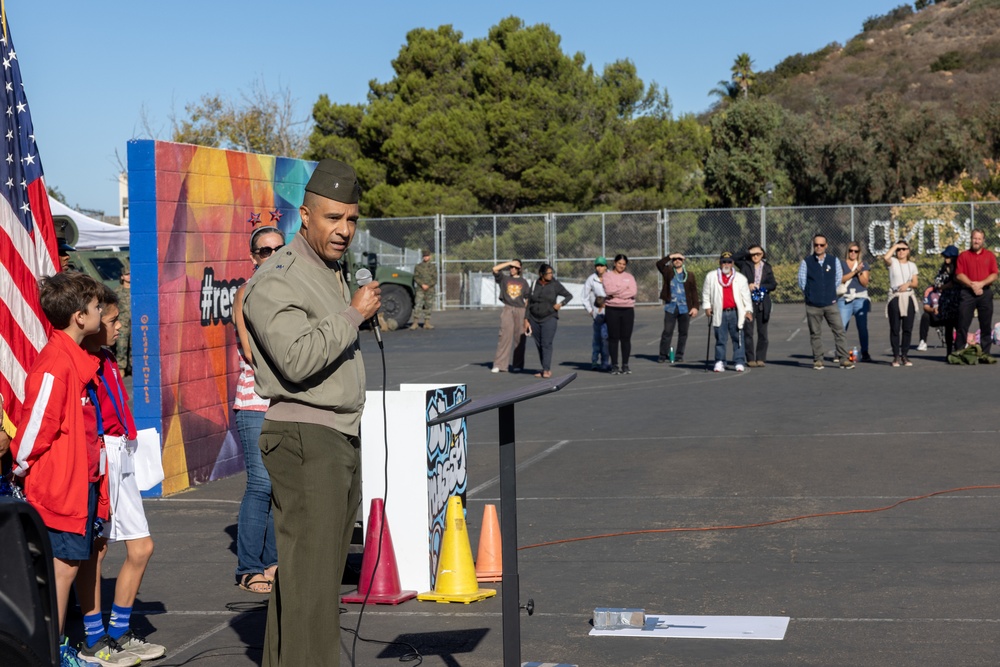 Marines spend time with students at the Annual Sunset Hills Elementary School Veterans Day Program