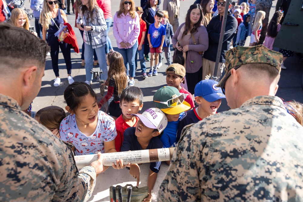 Marines spend time with students at the Annual Sunset Hills Elementary School Veterans Day Program