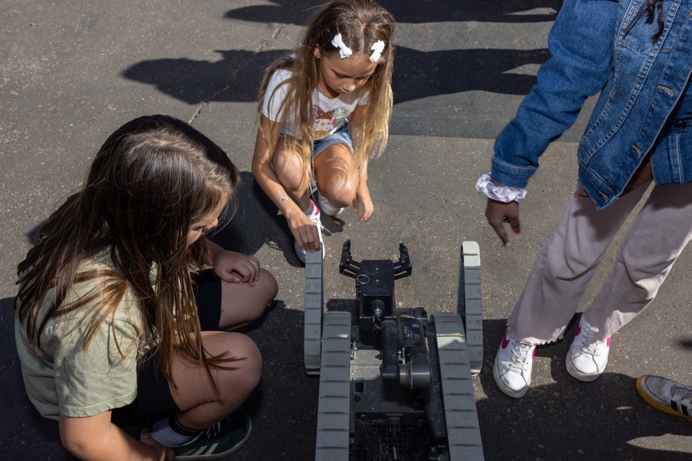 Marines spend time with students at the Annual Sunset Hills Elementary School Veterans Day Program