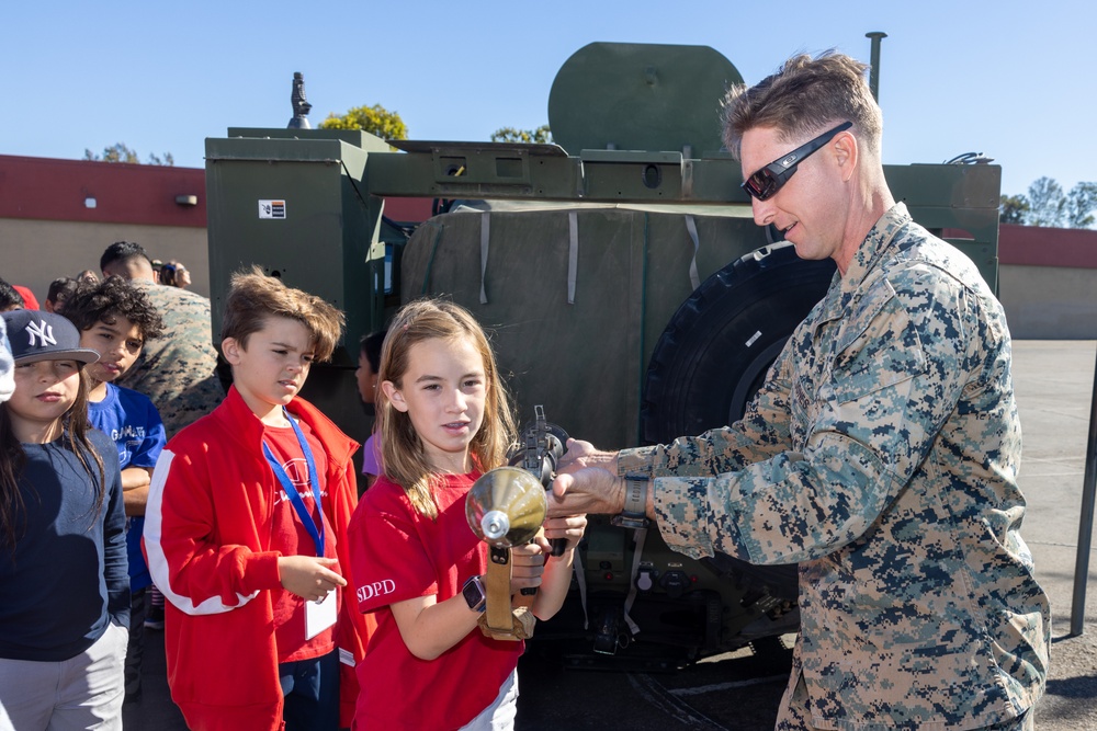 Marines spend time with students at the Annual Sunset Hills Elementary School Veterans Day Program