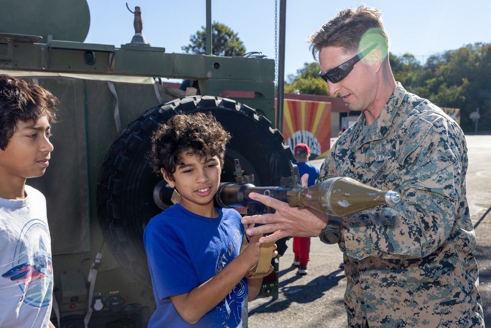 Marines spend time with students at the Annual Sunset Hills Elementary School Veterans Day Program