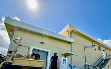 U.S. Coast Guard prepares for Tropical Storm Man-yi