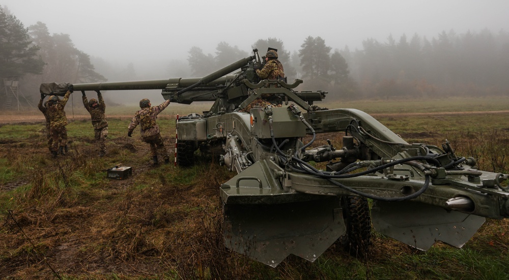 Italian Army artillery battery executes gun emplacement drills during Dynamic Front 25