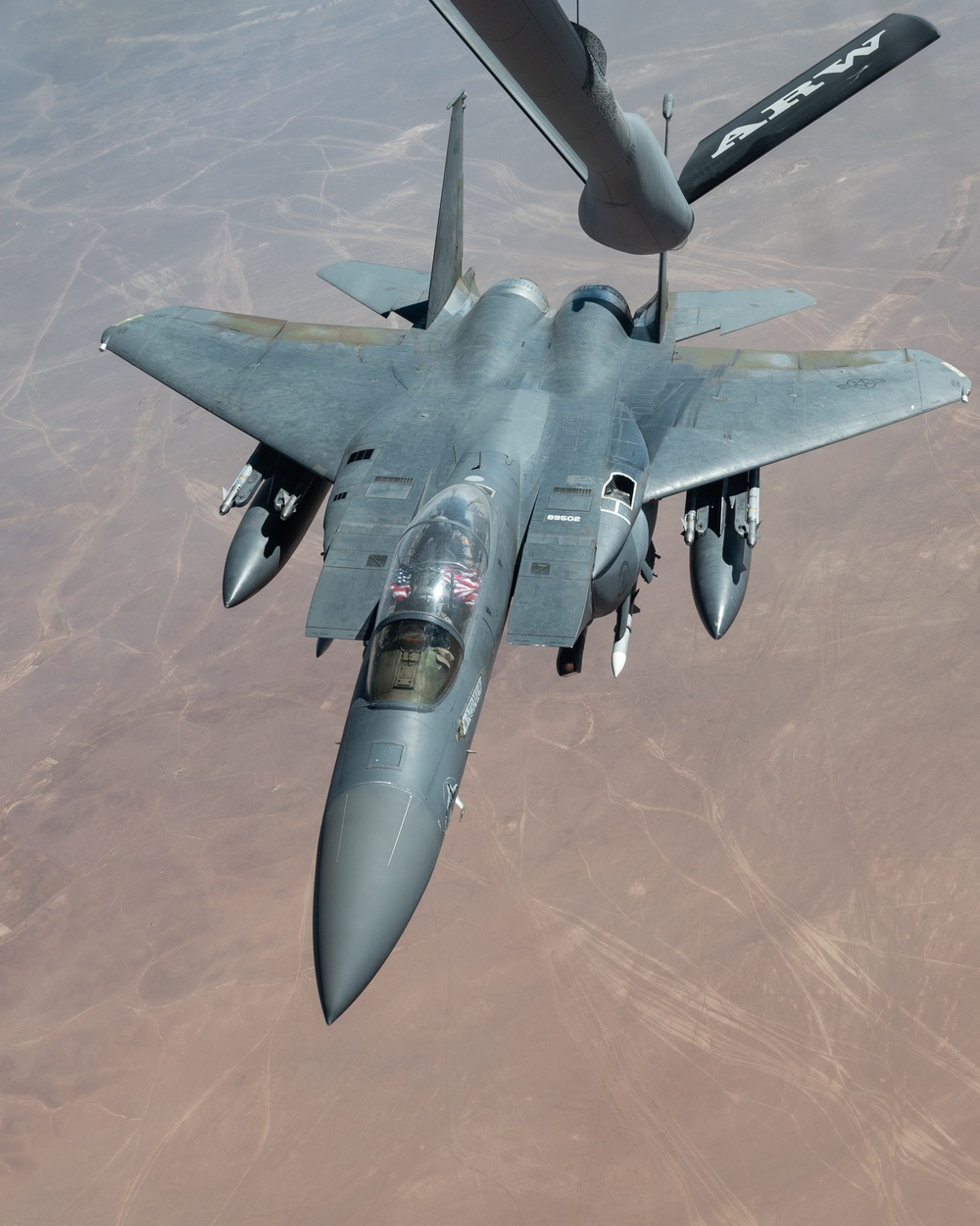 U.S. KC-135 refuels F-15 E Strike Eagles over CENTCOM