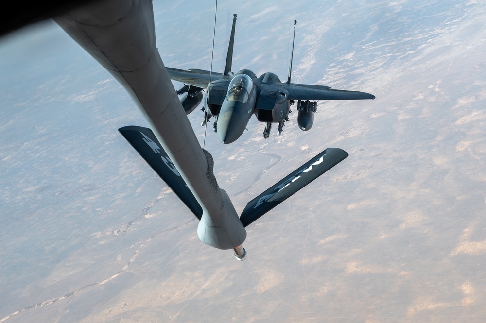U.S. KC-135 refuels F-15 E Strike Eagles over CENTCOM