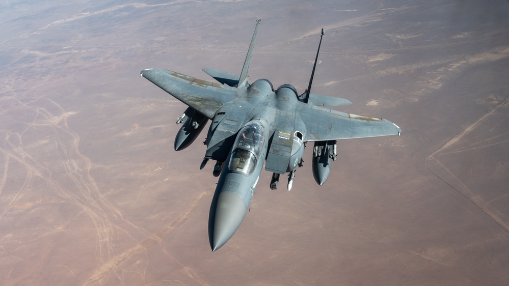 U.S. KC-135 refuels F-15 E Strike Eagles over CENTCOM
