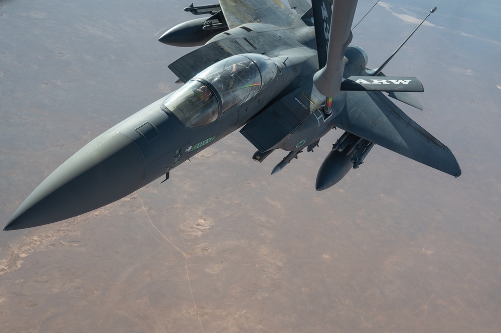 U.S. KC-135 refuels F-15 E Strike Eagles over CENTCOM