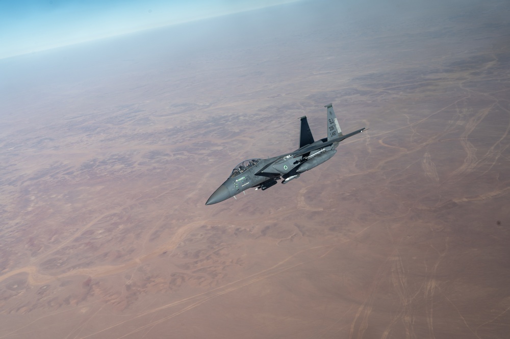 U.S. KC-135 refuels F-15 E Strike Eagles over CENTCOM