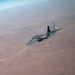 U.S. KC-135 refuels F-15 E Strike Eagles over CENTCOM