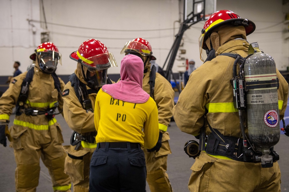 USS Ronald Reagan (CVN 76) Sailors participate in damage control drill