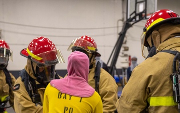 USS Ronald Reagan (CVN 76) Sailors participate in damage control drill