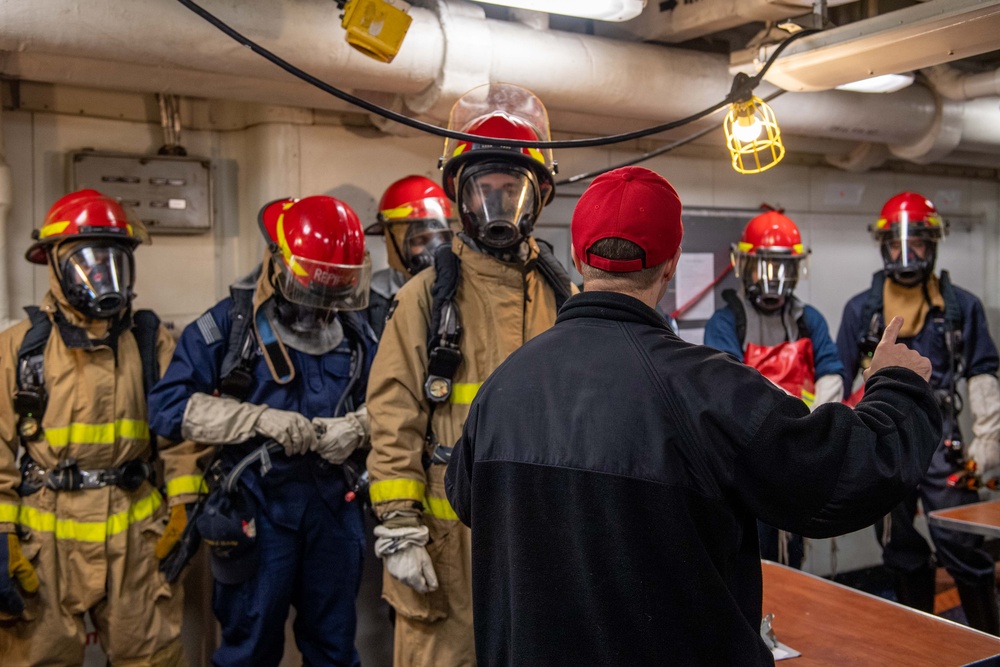 USS Ronald Reagan (CVN 76) Sailors participate in damage control drill